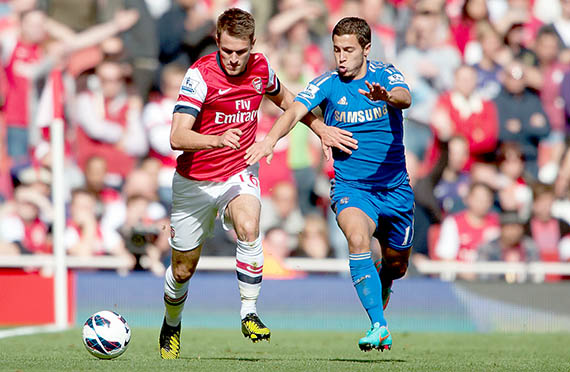 Aaron Ramsey of Arsenal and Oscar of Chelsea