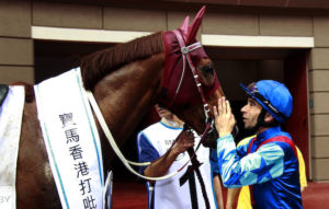 Joao Moreira with Rapper Dragon after their 2017 BMW HK Derby win (photo: HKJC)