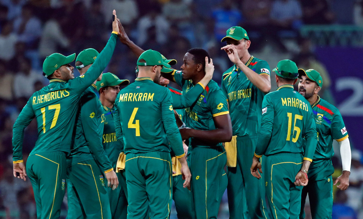 South Africa's Kagiso Rabada with teammates celebrate the wicket of Australia's Josh Inglis during the ICC Men's Cricket World Cup