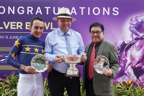 Jockey Marc Lerner (left) and trainer Daniel Meagher (centre) with owner Mr Lim Siah Mong after Lim's Saltoro's victory