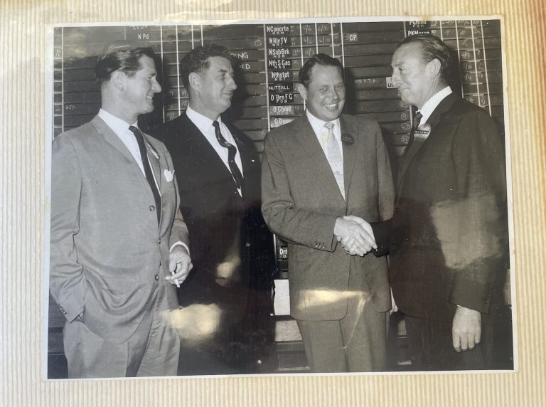 Frank and partners registering his business on the public Stock Exchange. L-R - Ken Stephens, Ellis Champion, a director of the Stock Exchange, Frank O’Neill (Pic - Manlyobserver)