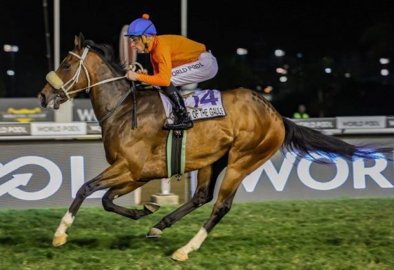 King Of The Gauls (Gavin Lerena) storms clear to win the LHKIR In December Listed Umngeni Handicap (Pic - Candiese Lenferna)