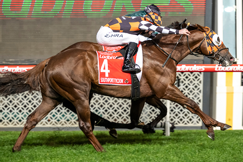 Southport Tycoon (Written Tycoon x Ready To Rule) ridden by Mark Zahra steals the Gr1 Manikato Stakes from Growing Empire (Craig Williams - on the rail) at Moonee Valley (Pic – Magic Millions)