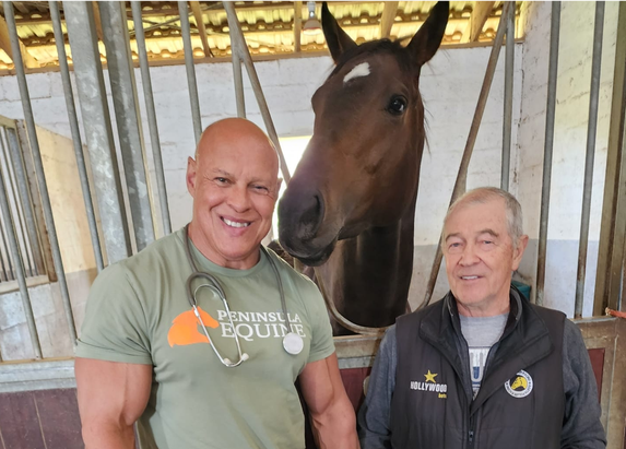 Trainer Garth Puller (seen here with Dr. John Charles) sends out Apex Predator in the first (Pic - Supplied)