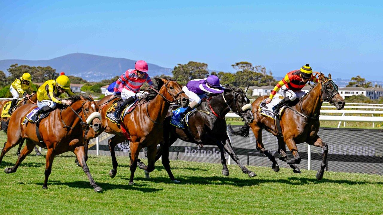 Rascallion (Gavin Lerena), Zapatillas (Kabelo Matsunyane, purple cap), Gimme A Prince (Craig Zackey, yellow cap) and Montien (Anthony Andrews, pink cap) fight out a thriller (Pic – Chase Liebenberg)