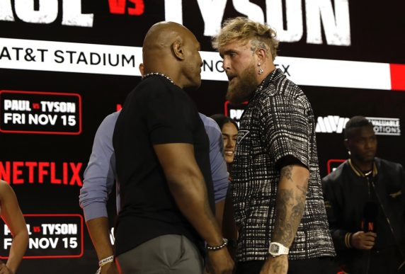 Former heavyweight boxing champion Mike Tyson (L) and YouTuber and professional boxer Jake Paul come face to face during a pre-fight press conference at the Javits Center in New York (Pic - EPA/Peter Foley)