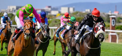 Craig Zackey drives Tsunami Warning up the outside as Sean Veale has Trippi’s Silk challenging hard (Pic - Chase Liebenberg)