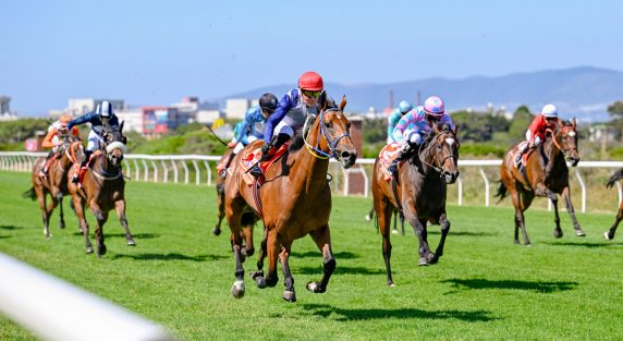 Despite travel and a wide draw, Fatal Flaw (Piere Strydom) took one for the ‘away team’ at Hollywoodbets Kenilworth (Pic – Chase Liebenberg)