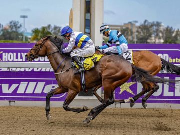 Gimmethegoodlife (Marco van Rensburg) beat Richardthefearless (Tristan Godden) on the poly at Hollywoodbets Greyville (Pic - Candiese Lenferna)